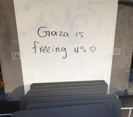 graffiti: gaza is freeing us. photo: Mathias Berek